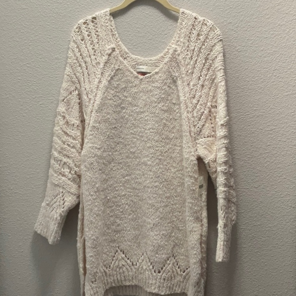Pilcro(Anthropology) gives us a beautiful cable knit Sweater in a size medium.